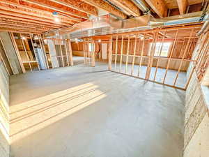 Basement featuring water heater