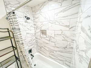 Bathroom with shower / bath combo