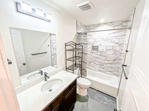Full bathroom with vanity, shower / bathtub combination with curtain, and recessed lighting
