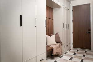 Mudroom featuring light flooring