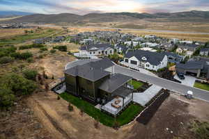 Aerial view at dusk of a mountain view and a residential view