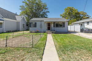 Bungalow-style home featuring roof with shingles