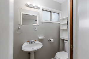 Half bathroom featuring toilet