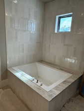 Bathroom featuring a garden tub