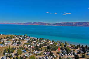 Aerial view of residential area with a water and mountain view