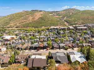 Aerial view of residential area with mountains