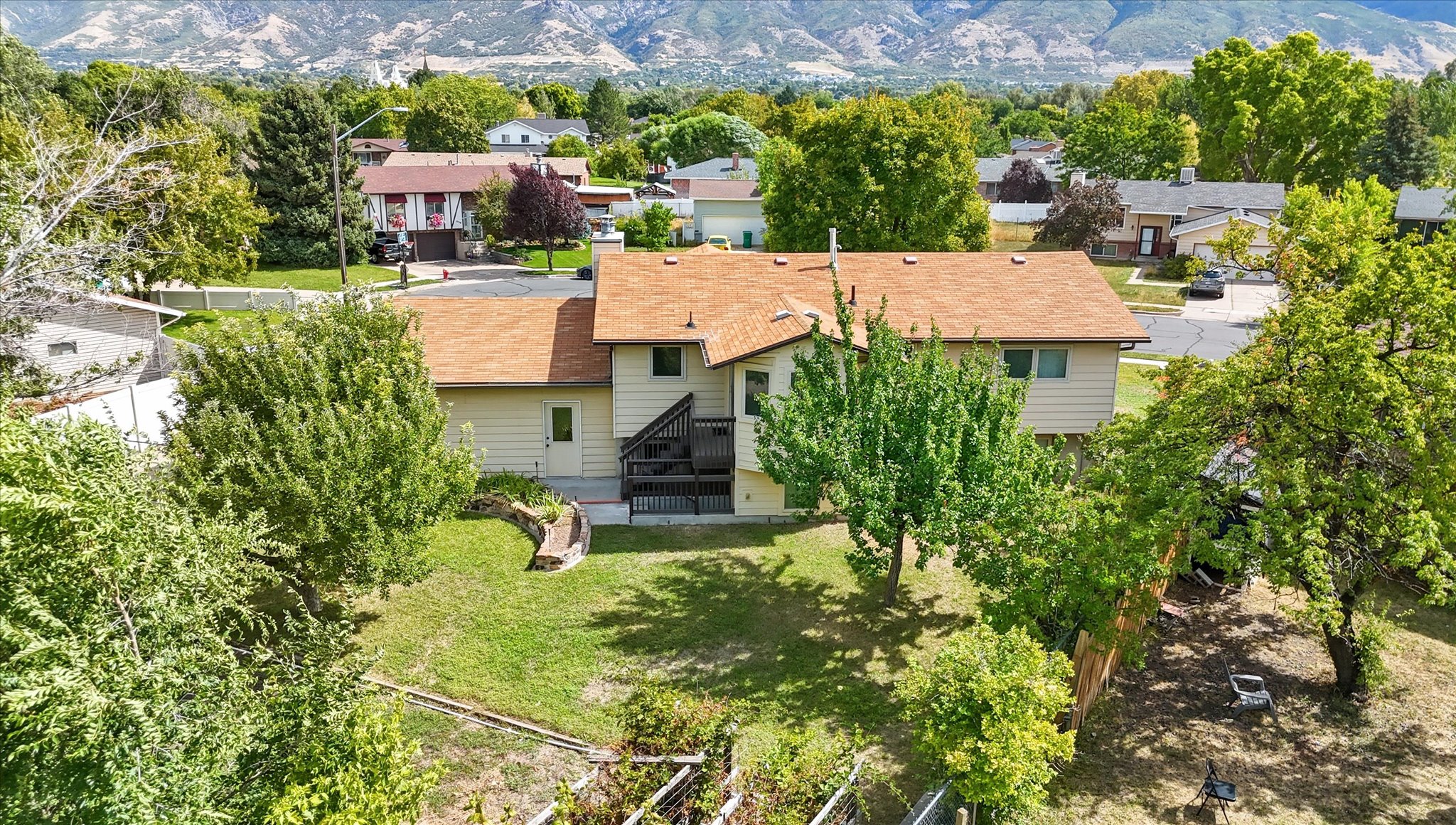 Aerial perspective of suburban area with mountains