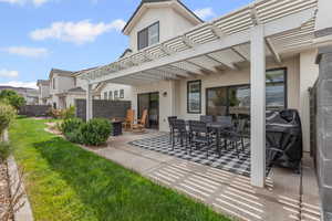 View of patio / terrace with a pergola and outdoor dining area