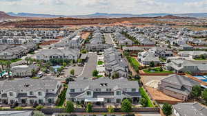 Aerial view of residential area with a mountain backdrop