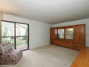 Large, master bedroom with sliders.