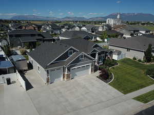 Aerial perspective of suburban area with mountain view