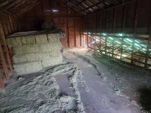 Miscellaneous room featuring vaulted ceiling