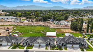 Aerial perspective of suburban area featuring mountains