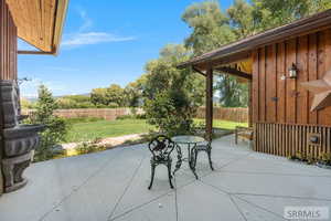 Fenced backyard featuring a patio area