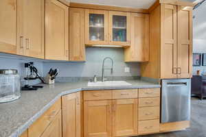Kitchen featuring Bosch dishwasher and maple cabinets