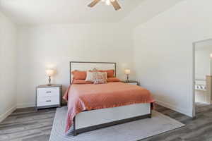 Bedroom with wood finished floors and ceiling fan