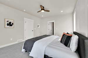 Bedroom with carpet floors, recessed lighting, and ceiling fan