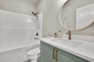 Full bath with tub / shower combination and vanity