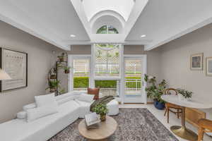Living area featuring recessed lighting and carpet flooring