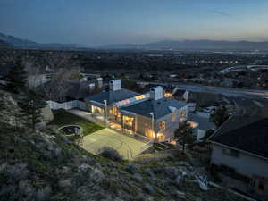 View from above of property with a mountain backdrop
