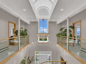 Detailed view of a chandelier and recessed lighting