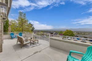 View of patio / terrace with a mountain view and outdoor lounge area