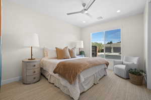 Bedroom with a ceiling fan, carpet flooring, and recessed lighting