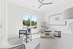 Office \ bedroom with recessed lighting and ceiling fan, walk in closet