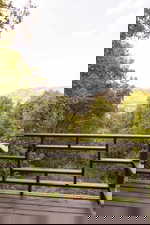 Wooden deck featuring a mountain view