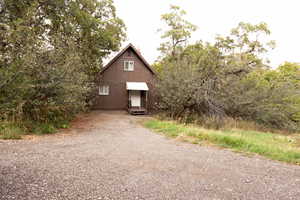 Chalet / cabin featuring a chimney