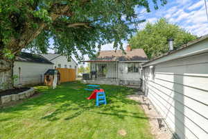 View of yard with a deck