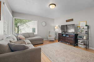 Living area with light wood finished floors