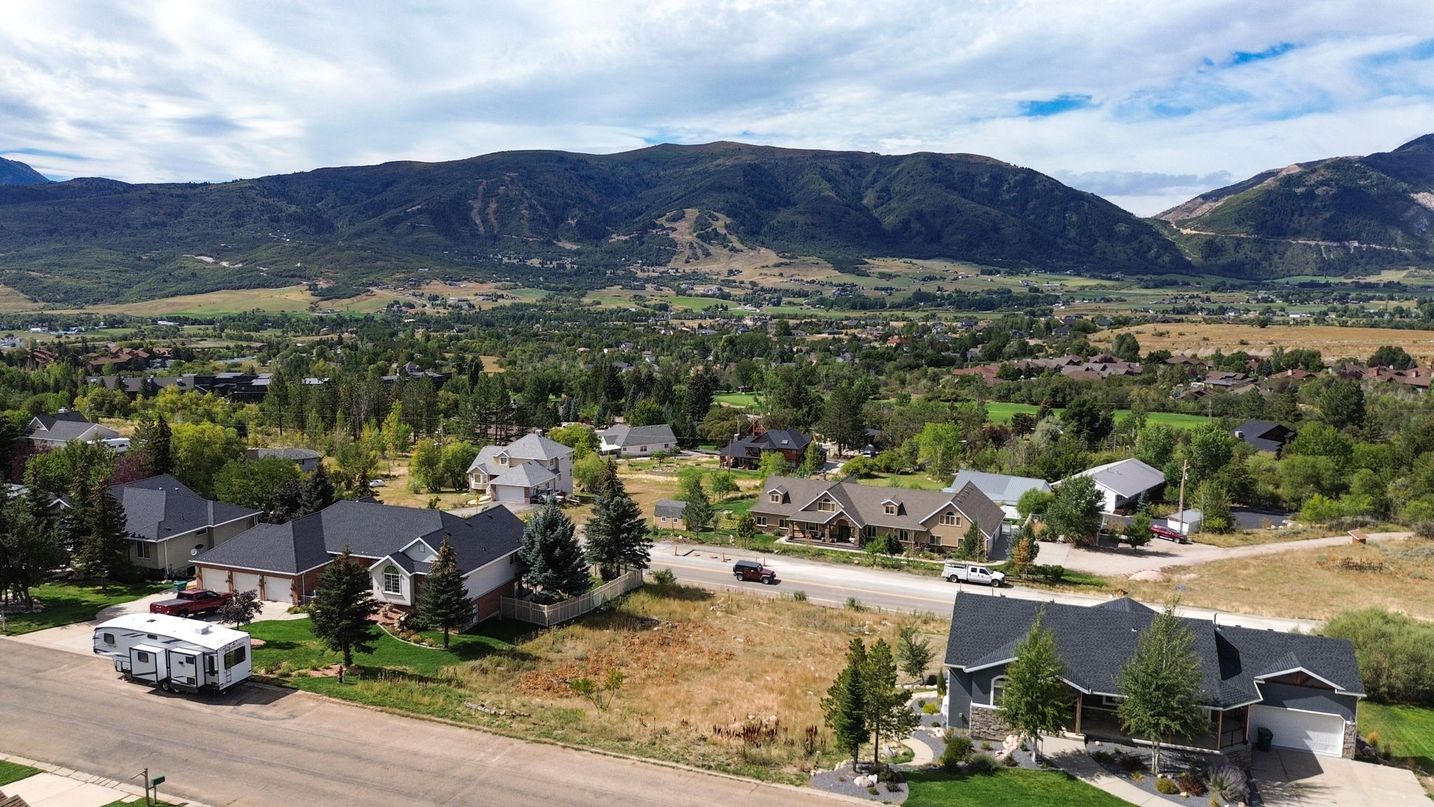 Aerial view of residential area with mountains