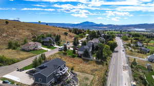 Aerial perspective of suburban area featuring mountains