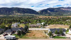Aerial view of residential area with a mountainous background