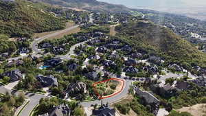 Aerial view of property and surrounding area with property parcel outlined View to the South