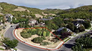 Aerial overview of property's location with property parcel outlined close up