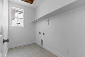 Laundry room featuring hookup for an electric dryer and washer hookup