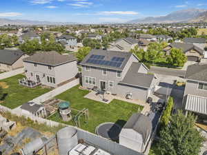 Aerial view of residential area featuring mountains