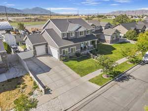 Aerial view of residential area featuring mountains