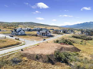 Aerial view of residential area featuring mountains