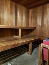 Relaxing steam sauna with wood ceiling and walls