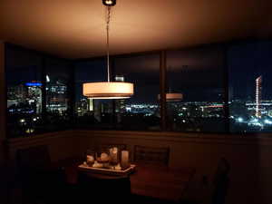 Stunning views of city light at night from dining room.