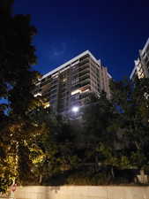 View of condo at twilight