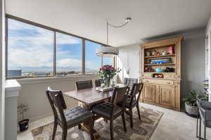 Dining space featuring city views