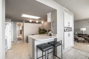 Kitchen featuring a breakfast bar