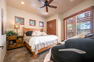 Bedroom featuring recessed lighting, a ceiling fan, a closet, and tile patterned flooring