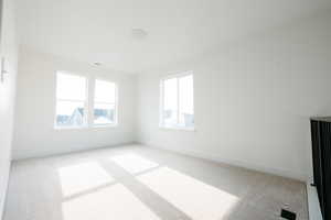 Empty room featuring carpet