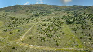 Aerial overview of property's location featuring mountains and rural landscape