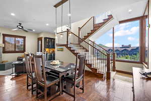Stairs to bedrooms and large picture windows